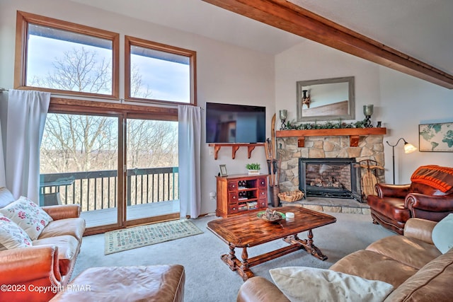 296 Overlook Way, Tannersville, PA 18372 - living area with carpet floors, plenty of natural light, a stone fireplace, and lofted ceiling