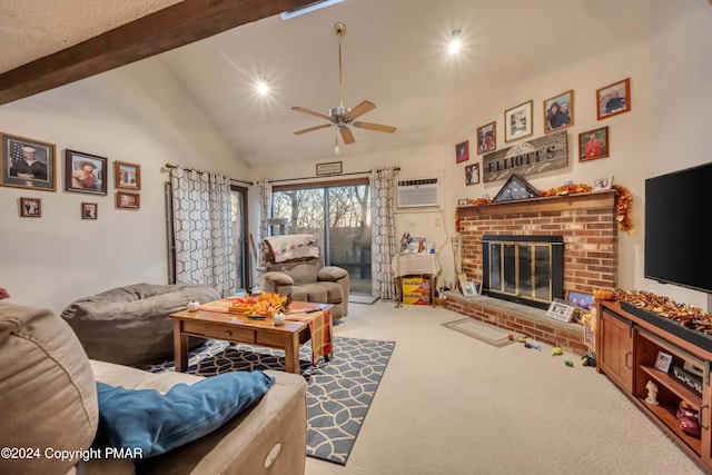 carpeted living area with an AC wall unit, a fireplace, lofted ceiling with beams, and ceiling fan