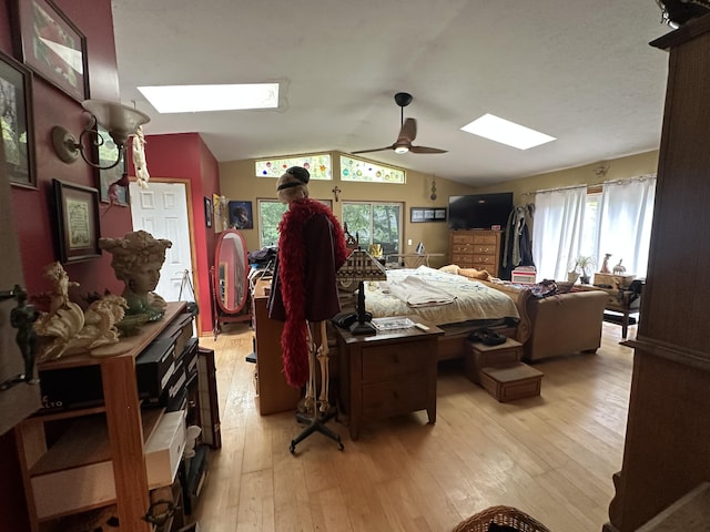 152 Fairview Ave, Mount Pocono, PA 18344 - bedroom with a skylight, light wood-style flooring, vaulted ceiling, and ceiling fan