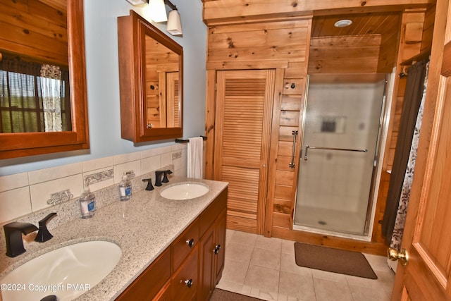 106 Windsor Dr, Lake Ariel, PA 18436 - full bath featuring double vanity, a stall shower, and tile patterned floors