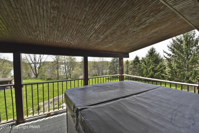 106 Windsor Dr, Lake Ariel, PA 18436 - deck with a lawn, a hot tub, and view of scattered trees