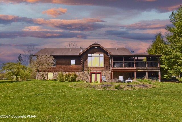 106 Windsor Dr, Lake Ariel, PA 18436 - rear view of property with stone siding, a yard, french doors, and a deck