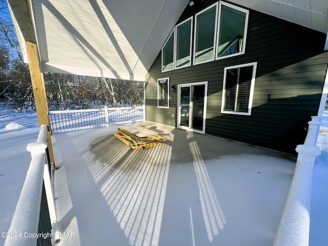 view of snow covered deck