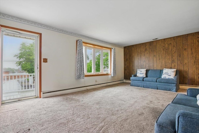 20 Cleveland Ave, East Bangor, PA 18013 - living room with a baseboard radiator, carpet floors, healthy amount of natural light, and wooden walls