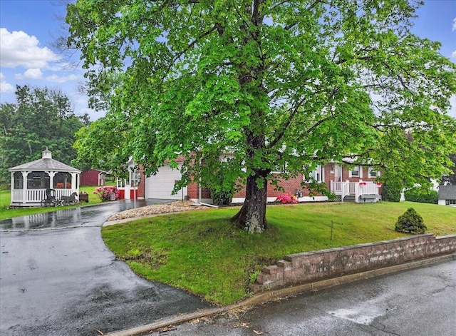 20 Cleveland Ave, East Bangor, PA 18013 - view of property hidden behind natural elements with a gazebo, driveway, a garage, and a front lawn