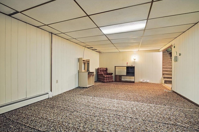 20 Cleveland Ave, East Bangor, PA 18013 - finished below grade area featuring carpet floors, stairs, a paneled ceiling, a baseboard heating unit, and wooden walls