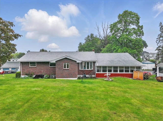 20 Cleveland Ave, East Bangor, PA 18013 - back of property featuring a yard and brick siding