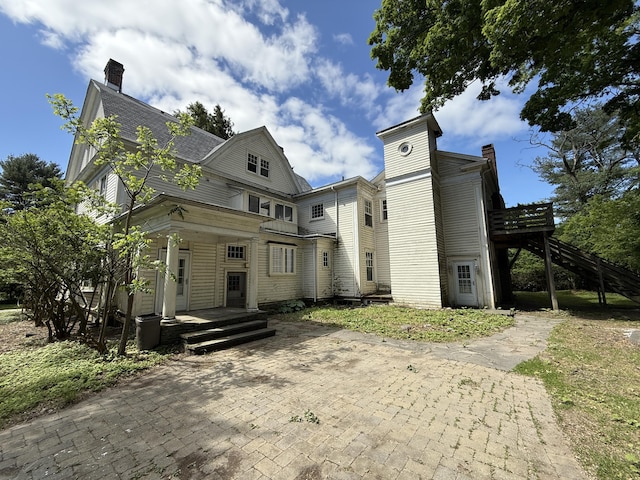 712 Thomas St, Stroudsburg, PA 18360 - view of front of home featuring a chimney