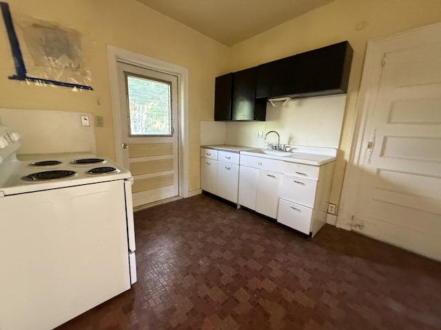 712 Thomas St, Stroudsburg, PA 18360 - kitchen featuring white range with electric cooktop, a sink, light countertops, and white cabinetry