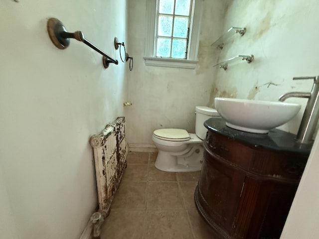 712 Thomas St, Stroudsburg, PA 18360 - bathroom featuring tile patterned flooring, toilet, and vanity