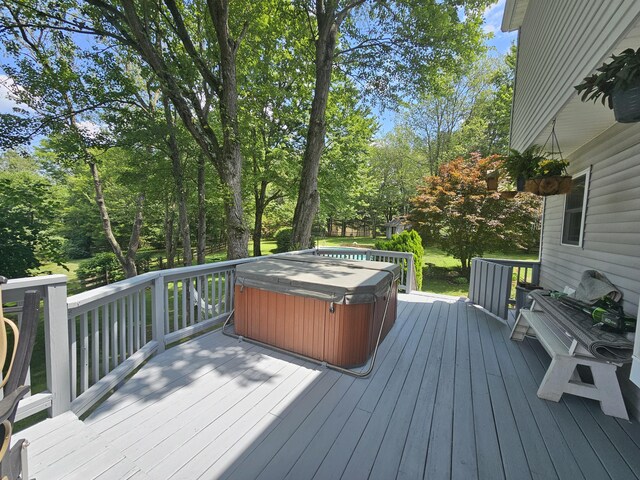 16 Kiloran Wynd Rd, Glenmoore, PA 19343 - wooden deck with a hot tub and view of wooded area