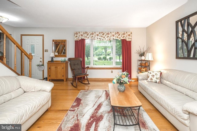 16 Kiloran Wynd Rd, Glenmoore, PA 19343 - living room featuring light wood finished floors and stairs