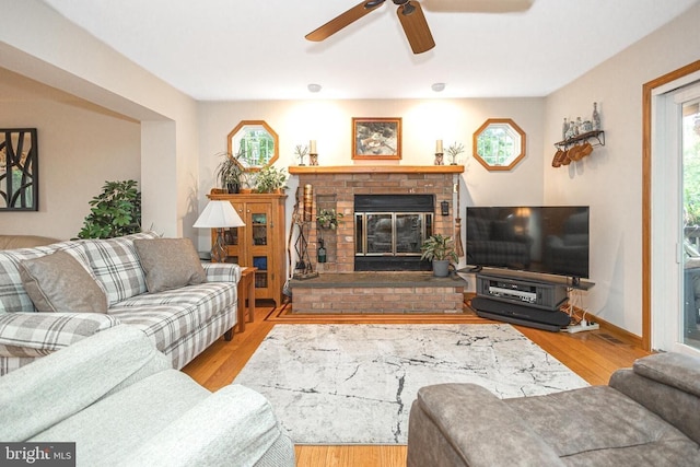 16 Kiloran Wynd Rd, Glenmoore, PA 19343 - living room with ceiling fan, wood finished floors, and a brick fireplace