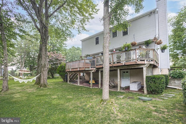 16 Kiloran Wynd Rd, Glenmoore, PA 19343 - rear view of property featuring stairway, a wooden deck, and a yard