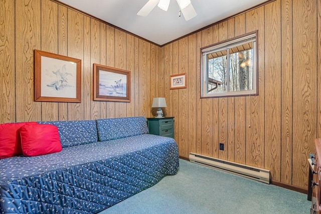 144 Beech Ln, Pocono Lake, PA 18347 - carpeted living area featuring baseboard heating, wooden walls, and a ceiling fan