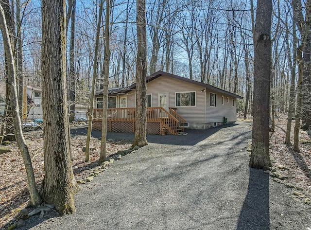 144 Beech Ln, Pocono Lake, PA 18347 - view of front of house featuring a deck