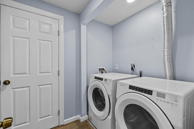 19 Conservancy Ct, Gouldsboro, PA 18424 - laundry area featuring washer and dryer, dark wood-style flooring, and baseboards