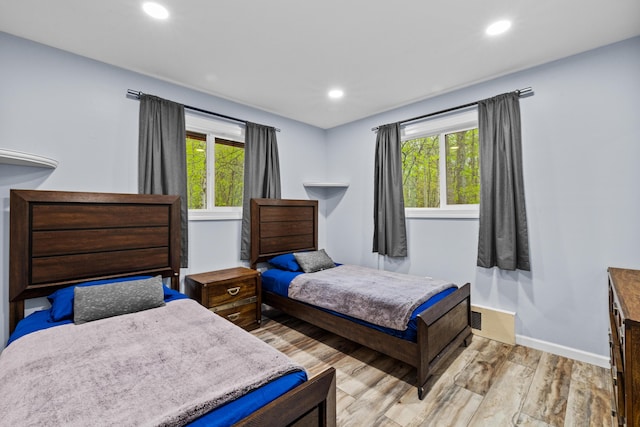 19 Conservancy Ct, Gouldsboro, PA 18424 - bedroom featuring multiple windows, light wood-style floors, baseboards, and recessed lighting