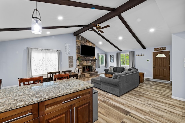 19 Conservancy Ct, Gouldsboro, PA 18424 - living area with light wood-type flooring, a fireplace, ceiling fan, recessed lighting, and baseboards