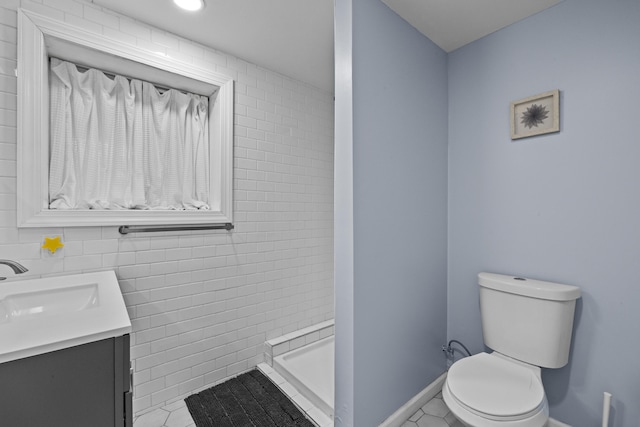 19 Conservancy Ct, Gouldsboro, PA 18424 - bathroom featuring toilet, vanity, a shower stall, baseboards, and tile patterned flooring