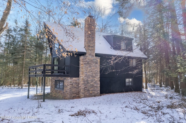 view of snow covered property