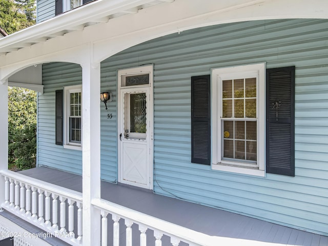 property entrance with a porch