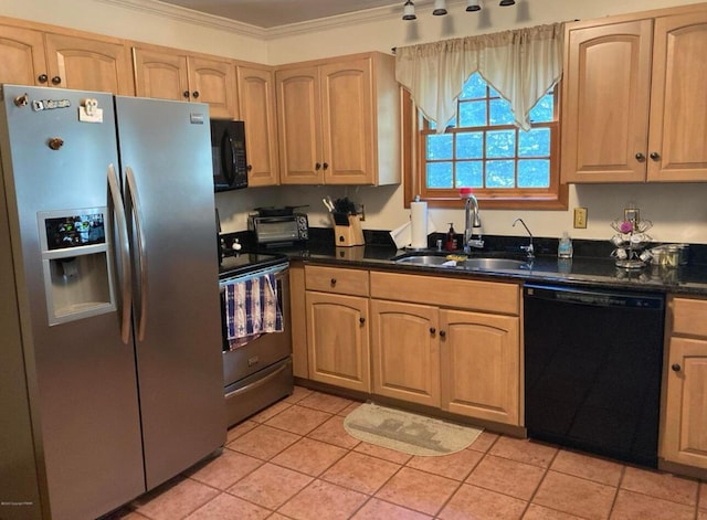 kitchen with dark countertops, crown molding, light tile patterned floors, black appliances, and a sink