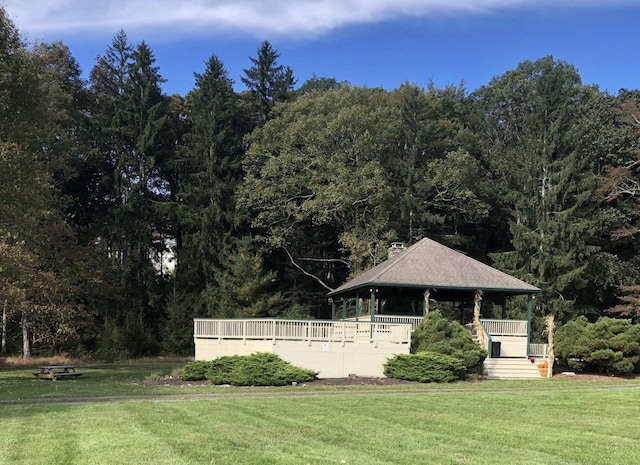 view of yard with a forest view