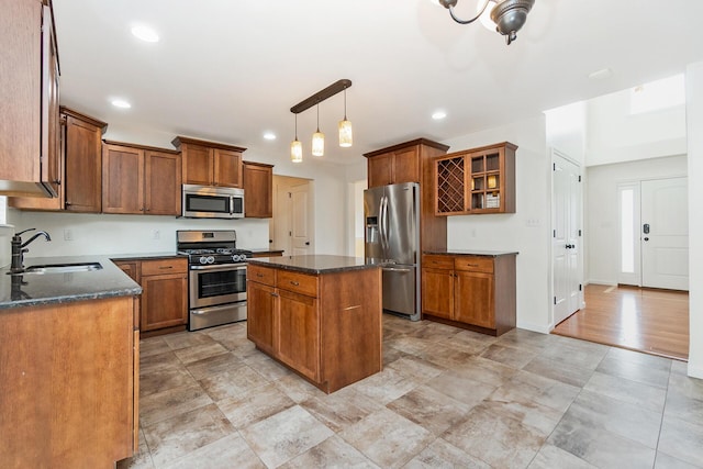621 E Princeton Ave, Palmerton, PA 18071 - kitchen with appliances with stainless steel finishes, a sink, a center island, brown cabinets, and recessed lighting