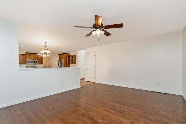 621 E Princeton Ave, Palmerton, PA 18071 - unfurnished living room featuring dark wood-type flooring, a ceiling fan, a chandelier, baseboards, and recessed lighting