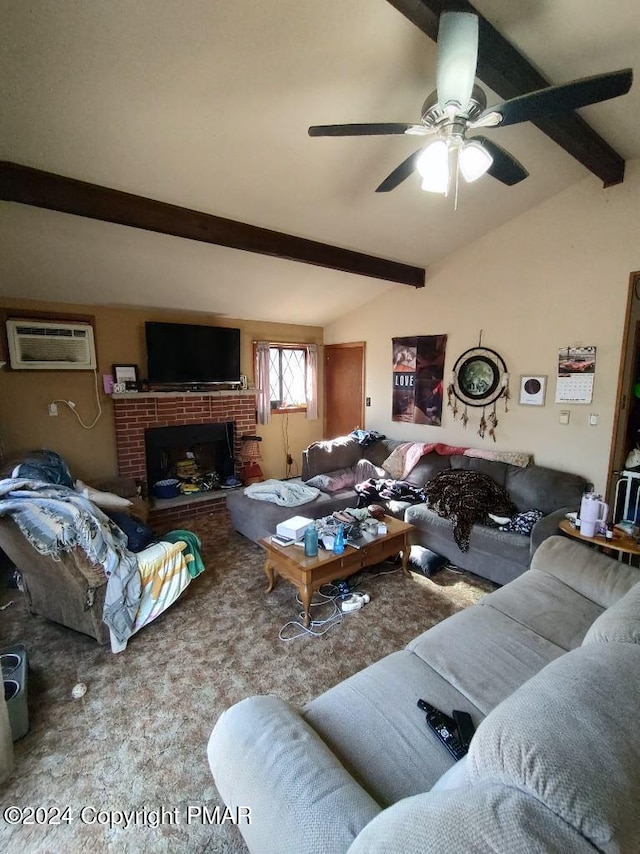 carpeted living room with lofted ceiling with beams, a brick fireplace, an AC wall unit, and a ceiling fan