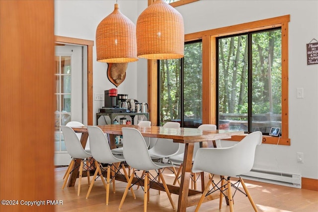 dining space featuring a baseboard radiator