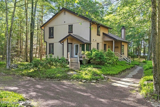 view of front of house with a chimney