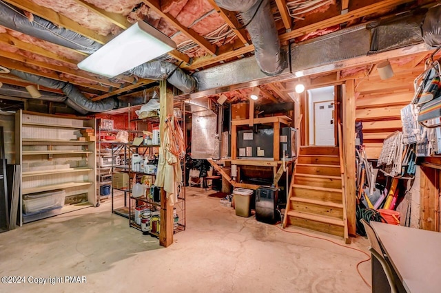 unfinished basement featuring stairs