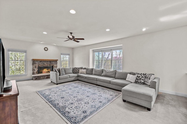 carpeted living area with a ceiling fan, recessed lighting, and a wealth of natural light