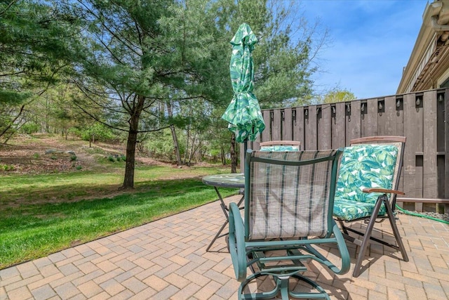 view of patio featuring outdoor dining area