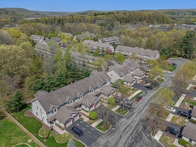 bird's eye view with a residential view and a forest view