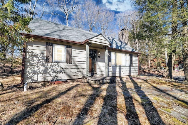 view of front of home with a chimney