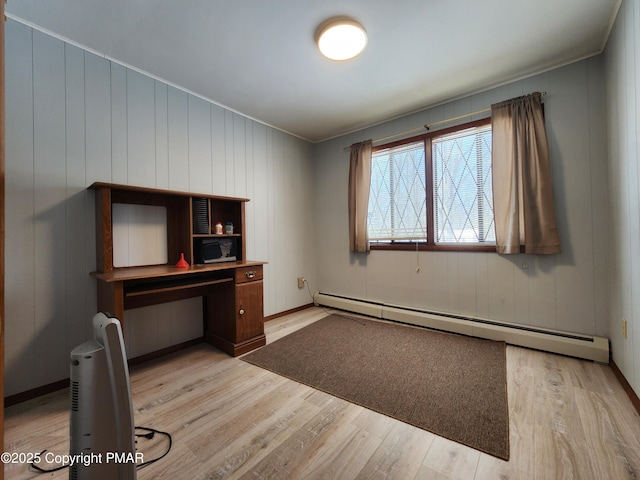 234 Saturn Dr, Bushkill, PA 18324 - unfurnished office featuring a baseboard heating unit, light wood-style flooring, and ornamental molding