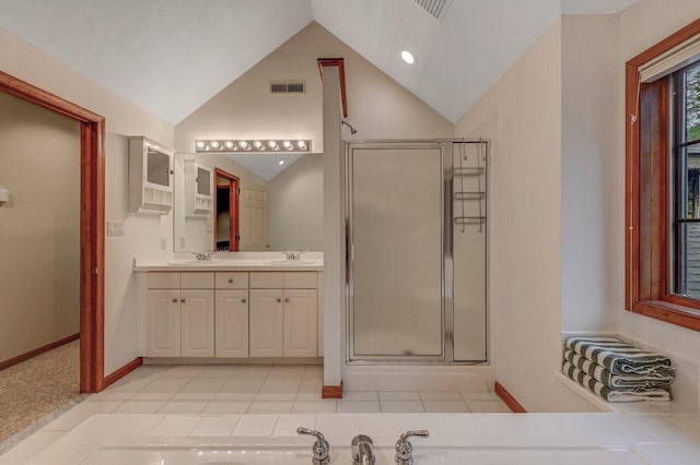 3110 Tall Timber Lake Rd, Pocono Pines, PA 18350 - bathroom with vaulted ceiling, a shower stall, baseboards, double vanity, and recessed lighting