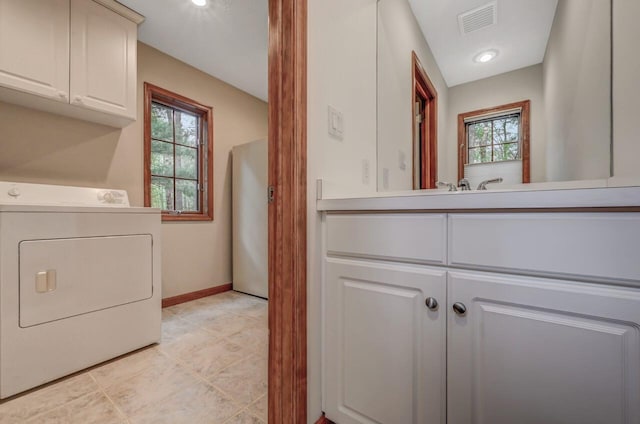 3110 Tall Timber Lake Rd, Pocono Pines, PA 18350 - laundry area featuring washer / clothes dryer, cabinet space, plenty of natural light, and light tile patterned flooring