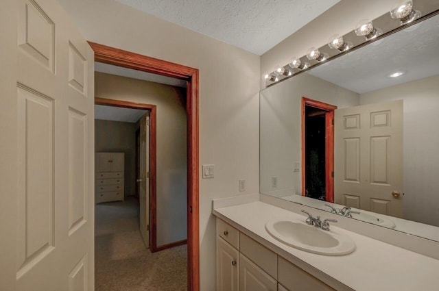 3110 Tall Timber Lake Rd, Pocono Pines, PA 18350 - bathroom featuring vanity, a textured ceiling, and baseboards