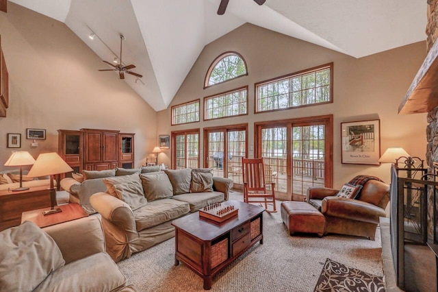 3110 Tall Timber Lake Rd, Pocono Pines, PA 18350 - carpeted living area with a ceiling fan and high vaulted ceiling