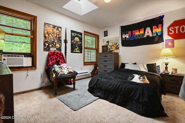 bedroom featuring cooling unit, a skylight, carpet flooring, and baseboards