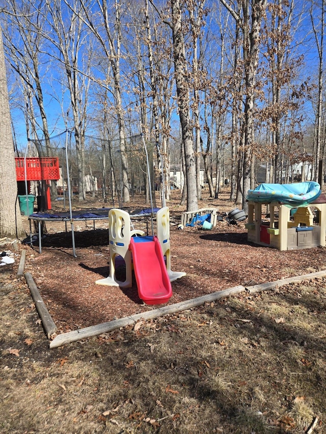 community playground featuring a trampoline