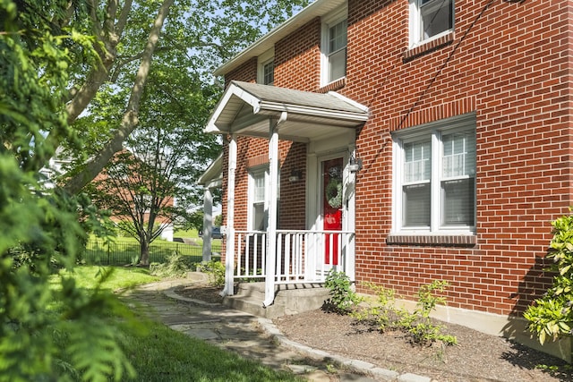 631 Main St, Tatamy, PA 18085 - property entrance featuring brick siding