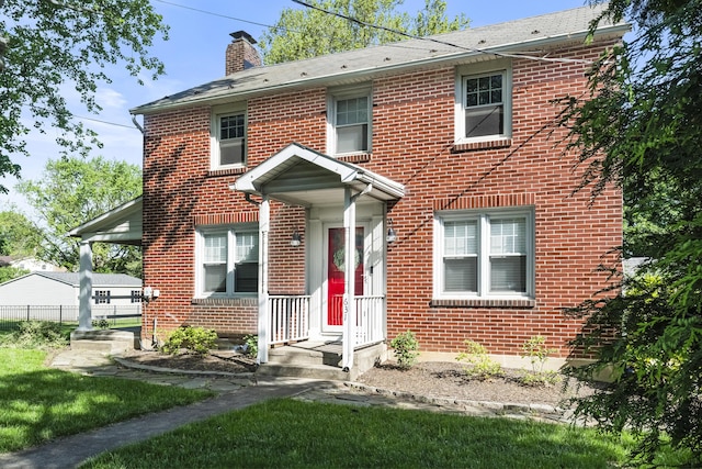 631 Main St, Tatamy, PA 18085 - view of front of house featuring brick siding and a chimney