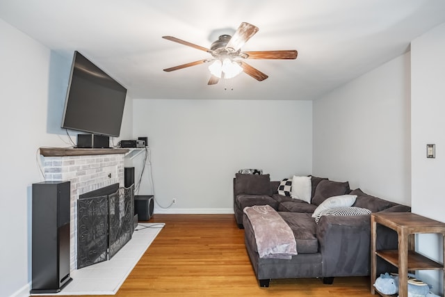631 Main St, Tatamy, PA 18085 - living room with ceiling fan, wood finished floors, a fireplace, and baseboards