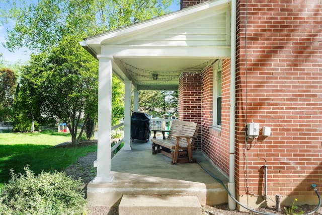 631 Main St, Tatamy, PA 18085 - covered porch with a grill and a yard
