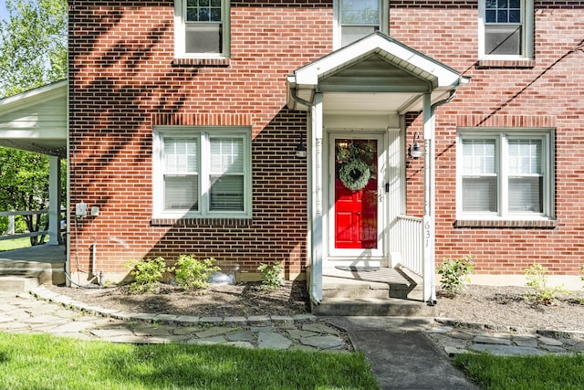 631 Main St, Tatamy, PA 18085 - property entrance featuring brick siding